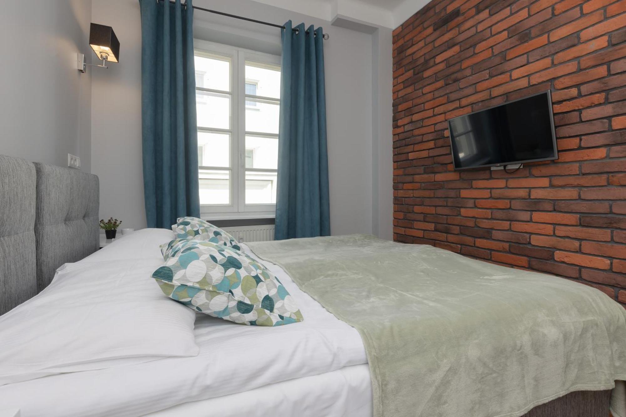 ורשה City Center Aparthotel Chmielna By Noclegi Renters מראה חיצוני תמונה